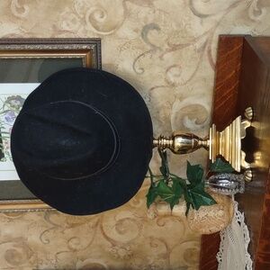 Western style hat, leather belted